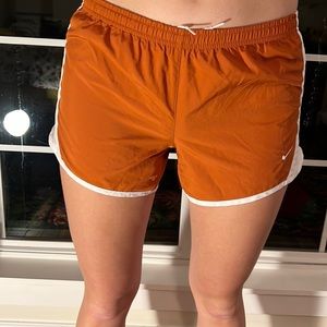 Nike running shorts burnt orange youth large